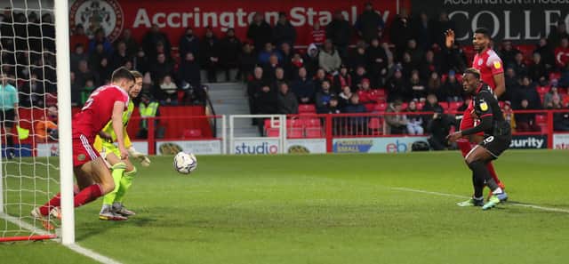 Freddie Ladapo has a chance early on at Accrington. Pictures: Richard Parkes and Jim Brailsford