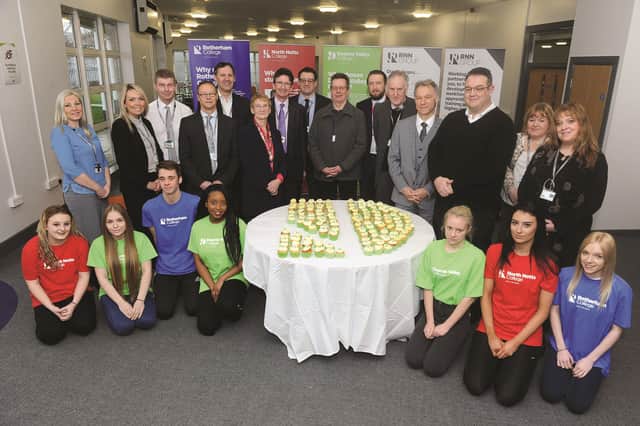 A launch ceremony was recently held at Dearne Valley College to celebrate the College's merger with the RNN Group (Rotherham and North Notts) and new signage. Staff, students and invited guests are seen at the launch. 170158-1