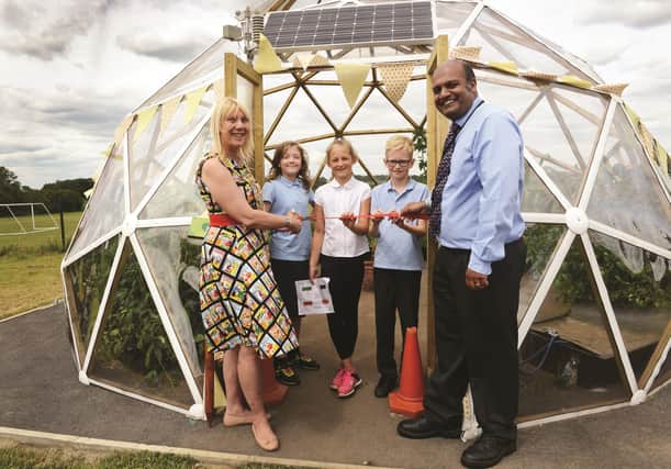 The Mayor of Rotherham Cllr Eve Rose Keenan is seen with the school's science co-ordinator Neil Pacheco and pupils (from left to right): Felicity Dungworth, Laura Kedziak and Ben Histon. 171074-1