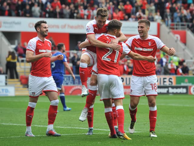 All smiles after Jerry Yates nets the Millers' fifth goal against Oldham.