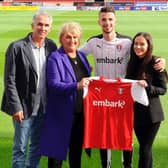 Dan Barlaser at New York Stadium to sign a permanent deal with mum Alison, dad Sener and partner Jade for company