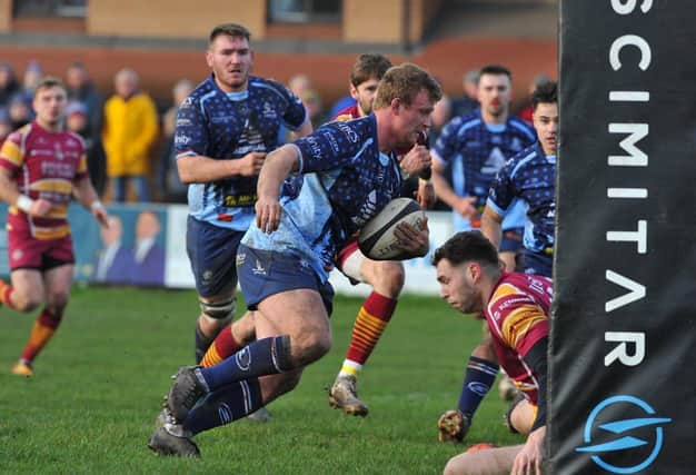 Harry Newborn goes over for Rotherham's try. Picture by KERRIE BEDDOWS
