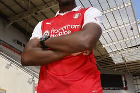 Christ Tiehi shows off his new Rotherham United colours