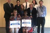 Rotherham CCG staff, including GPs, nurses, lay members, and executives celebrate the success