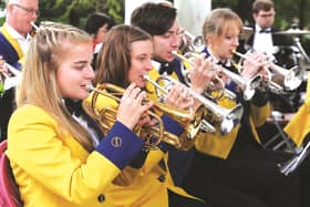 Dinnington Colliery brass band are seen performing in the Bandstand. 171540-41