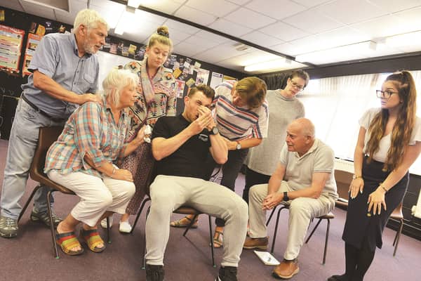 The Rep cast in rehearsal