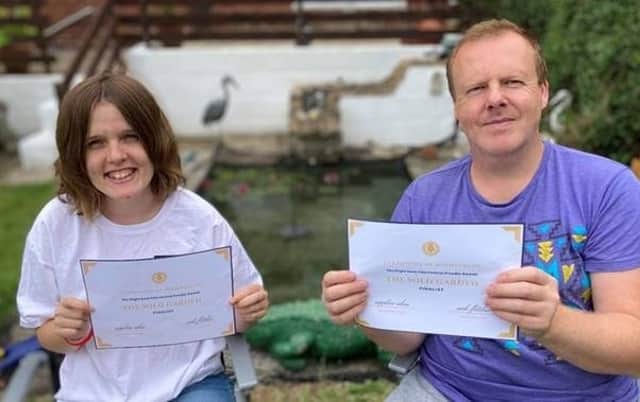 Rebecca (left) and Dean Sills with their Flight Desk Festival certificates.