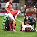 Joe Mattock is injured against Wycombe. Pictures by Dave Poucher