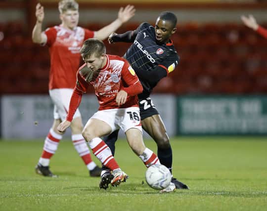 Hakeem Odoffin battles for possession at Crewe. Picture by Jim Brailsford