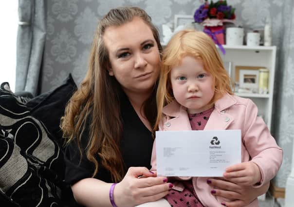 Chelsea Cairns who had her NatWest bank account frozen, pictured with daughter Poppy.