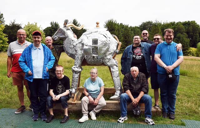 Members of the Wath Community Connect Group teamed up with local artist, Jason Thomson (3rd left), to produce a sculpture for the 'Forest of Bewilderment' area at Wentworth Woodhouse. The sculpture took four months to produce and will be named 'The Creature of Curiosity'. 230497-1