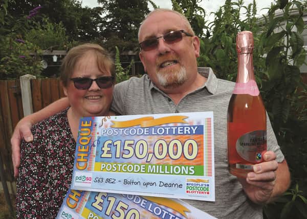 Lottery winners Diane and Peter Clegg celebrating at home in Bolton-on-Dearne.