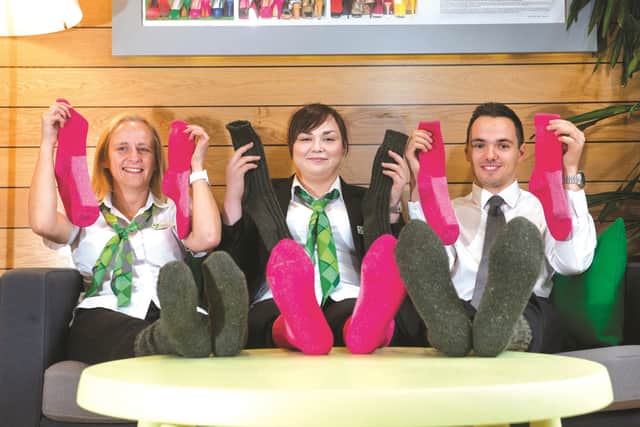 Pictured (from left to right) are: Yorkshire Building Society colleagues Claire Byrne, Natalie Butterworth and Adam Waterfall launch Socktober campaign in partnership with End Youth Homelessness