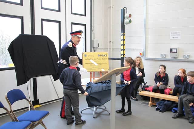 Lord Lieutenant for South Yorkshire, Mr Andrew Coombe, performs the official opening with pupils from Maltby Manor Academy.