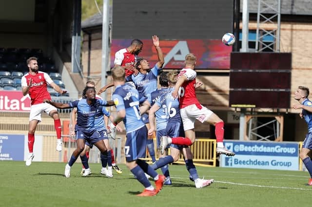 Michael Ihiekwe heads the 92nd-minute winner. Pictures by Jim Brailsford