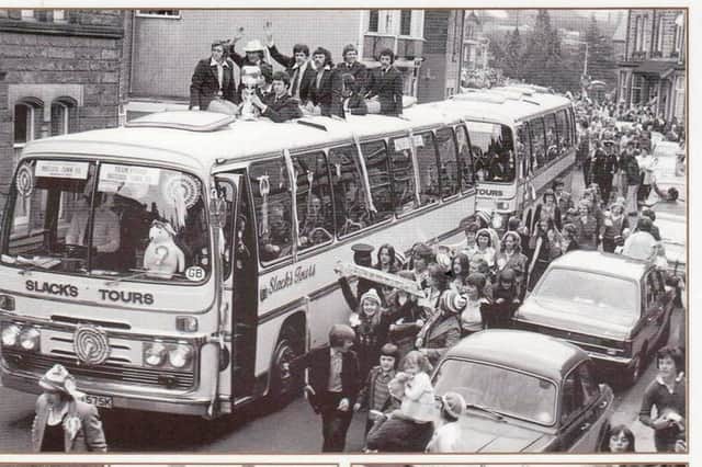 Matlock Town, including their contingent of Rotherham players, enjoy an open top bus parade through the Derbyshire town after winning the FA Trophy in 1975.