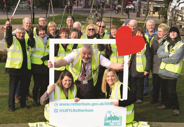 At the launch in Minster Gardens recently were, front row (from left to right): cabinet member for waste, roads and community safety Cllr Emma Hoddinott, Love Where You Live co-ordinator Wayne Munro-Smith and assistant director of community safety and street scene Karen Hanson along with councillors and volunteer litter pickers