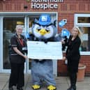 Pictured from left: Kelsi Sukumar, head of Rotherham Hospice inpatient unit, company mascot Arena Owl and hospice corporate fundraising manager Sharon Thompson