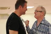 L-R: Jack (Mark Hone) and Dennis (Shaun Hollingworth) in rehearsals, arguing over Jack’s plea of self-defence.