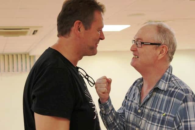 L-R: Jack (Mark Hone) and Dennis (Shaun Hollingworth) in rehearsals, arguing over Jack’s plea of self-defence.
