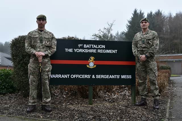 WO1 Jamie Pearson (left) with his successor as regimental sergeant-major, WO1 Chris Barnes.