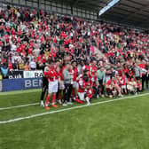 The class of 2023 ... the Millers celebrate their survival after beating Middlesbrough
