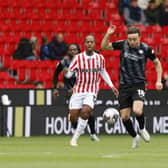 Ollie Rathbone in first-half action for Rotherham United in the Championship at Stoke City: Picture: Jim Brailsford