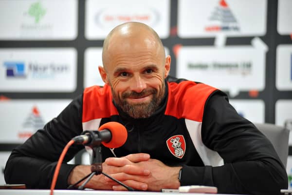 All smiles... Warne announced as Rotherham United manager