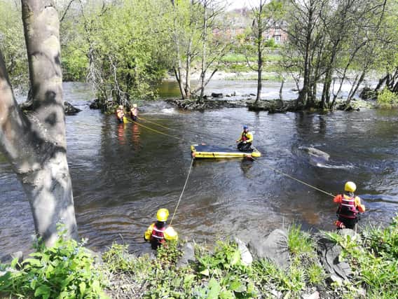 Some of the officers in action during the two-day water rescue training in Wales.