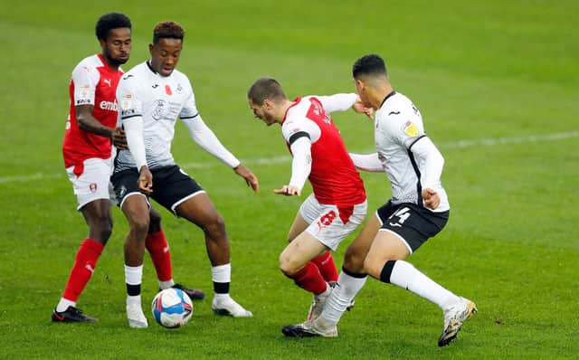 Ben Wiles and Matt Olosunde in first-half action. Picture by Jim Brailsford