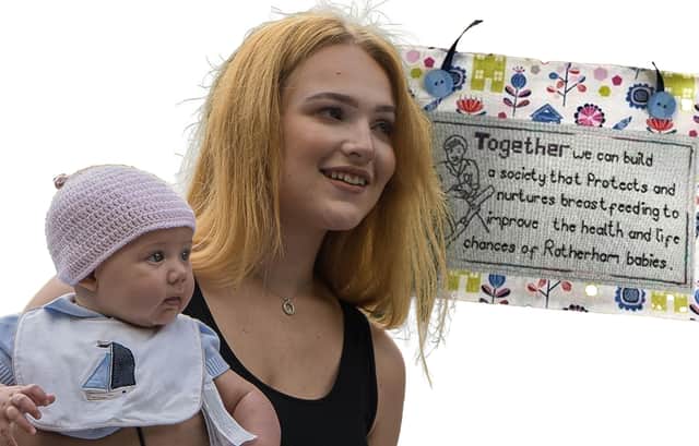 A baby wears one of the 'boob hats' designed to raise awareness of breastfeeding in public spaces in Rotherham NHS Foundation Trust's campaign last summer