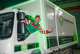 Sheffield secure shredding business Russell Richardson turn their mobile shredder green with neon lights for the festive season