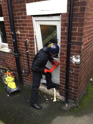 A warrant being executed as part of Operation Duxford