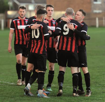 Maltby Main celebrate their opener against Newcastle University on Saturday. Picture by DAVE POUCHER