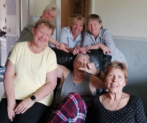 Olivia Torr (bottom right), pictured with her father Eddie Leigh, and sisters Rita Hukin, Lorraine Unstead, Kerry Newman and Theresa Cato.