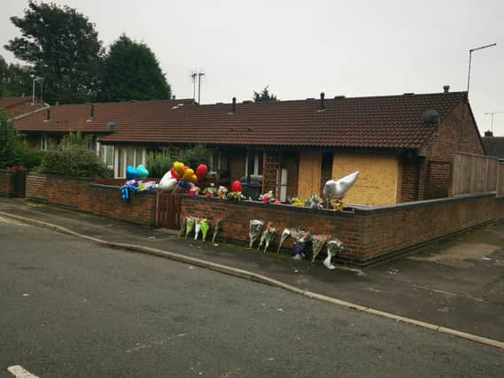 Floral tributes have been left at the bungalow where the man died