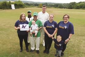 Danielle is pictured with, from left to right: daughter Faye Orton, Scholes cricketer Hasan Ali, husband David Watson with baby Leo, Scholes cricketer Matthew Holmes, daughter Ebonie and son Tyger.