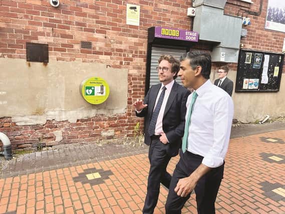MP Alexander Stafford shows Rishi Sunak around Dinnington last summer