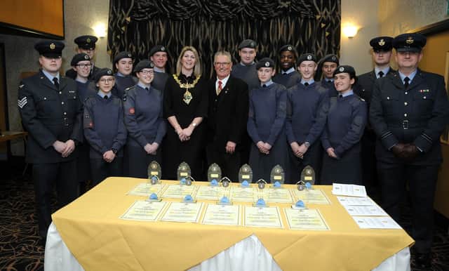 Members of the 218 (Rotherham) Squadron Drill Team are pictured with the Mayor of Rotherham Cllr Lyndsay Pitchley and Consort Alex Armitage at a special reception held at Rotherham Town Hall to mark their achievement