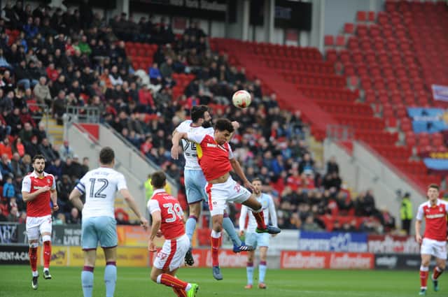 Tom Adeyemi challenges for the ball in Saturday's defeat