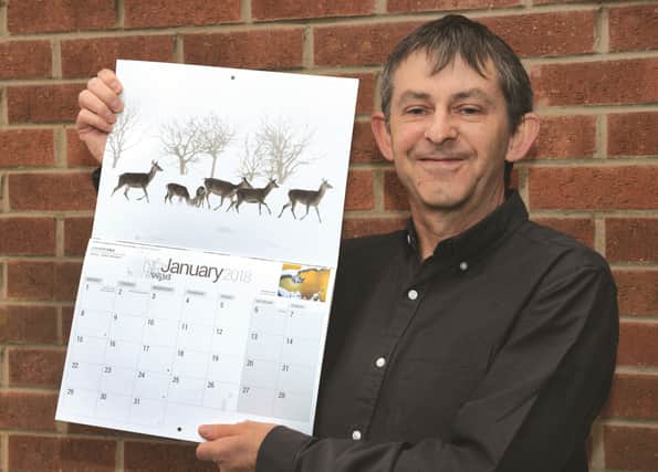 Maltby photographer Kevin Dolby with his photograph of deer which has made it into the BBC Countryfile Calendar. 171747
