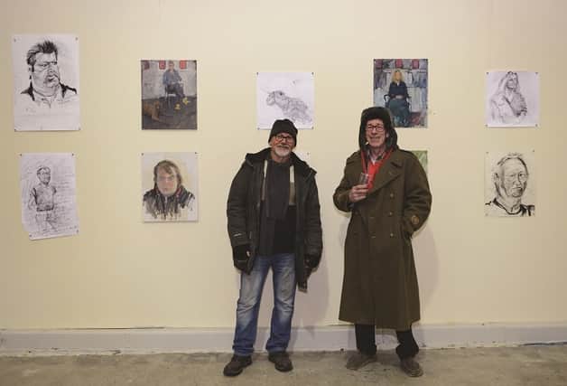 Artists Chris Slater (left ) and Ken Horne at the launch of their 100 Portraits exhibition at the Old Factory. 172062-1