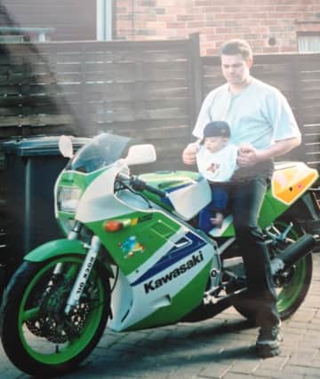 Mark and son Andrew pictured with his Kawasaki KR1S around 14 years ago