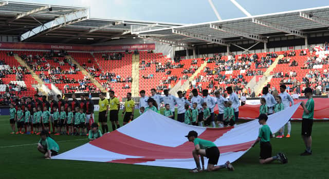 The teams line up before last week's Group clash between England and Switzerland.