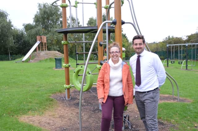 Angela Harrison, clerk to Whiston Parish Council, which received £3,000 towards the completion of a play park in the village, with Lewis Stokes, community relations manager at The Banks Group.