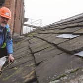 Seen inspecting the roof is Project Manager, Andy Stamford. 190148-3
