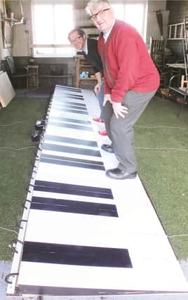 Andrew Trueman and Brian Twigg on the “Big Piano” Credit: MMTG