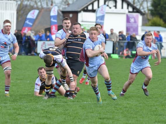 Try scorer Callum Irvine makes a break in Saturday's win over Caldy at Clifton Lane. Pictures: KERRIE BEDDOWS