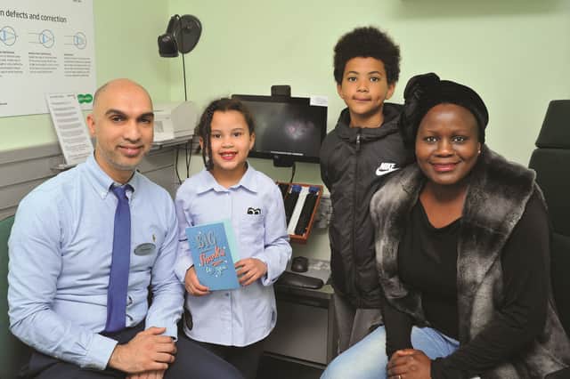 Roxanne Knight (second from left) with optometrist Saj Hussain, brother Ayden and mum Irene.