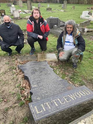 At George Littlewood's grave are (left) to right the Rev Dave Goddard, Baptist Minister at Treeton Baptist Church, Luke Elmore and Norman Zide.